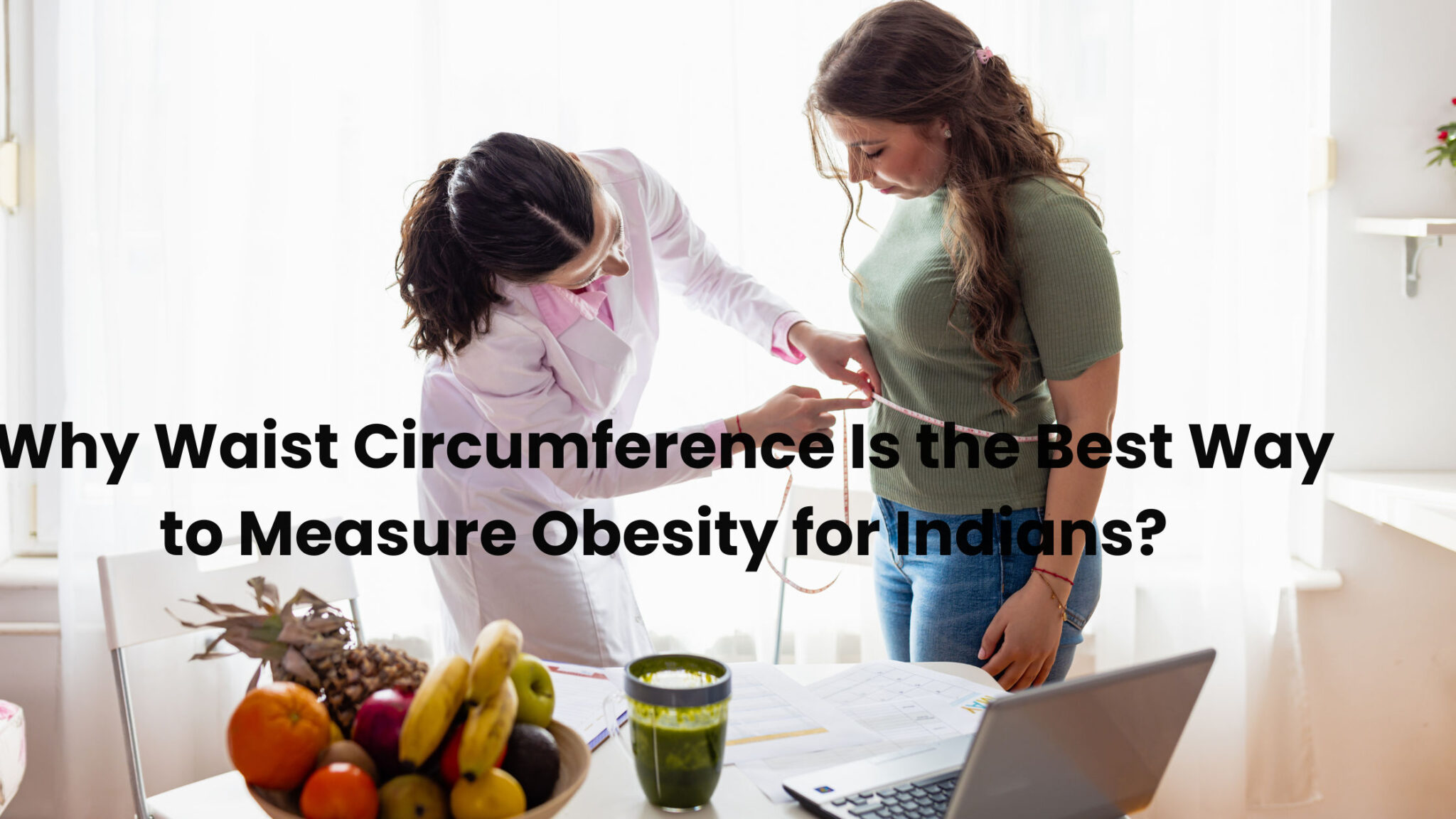 Nutritionist checking waist size of an Indian woman to evaluate belly fat risk.